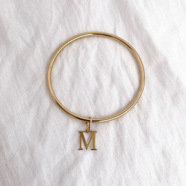 jonc classique avec médaille initiale
