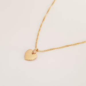 collier chaîne torsadée et médaille coeur bombé